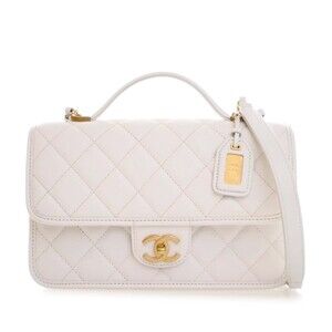 Pre-Loved Chanel Medium Quilted Caviar School Memory Top Handle Flap